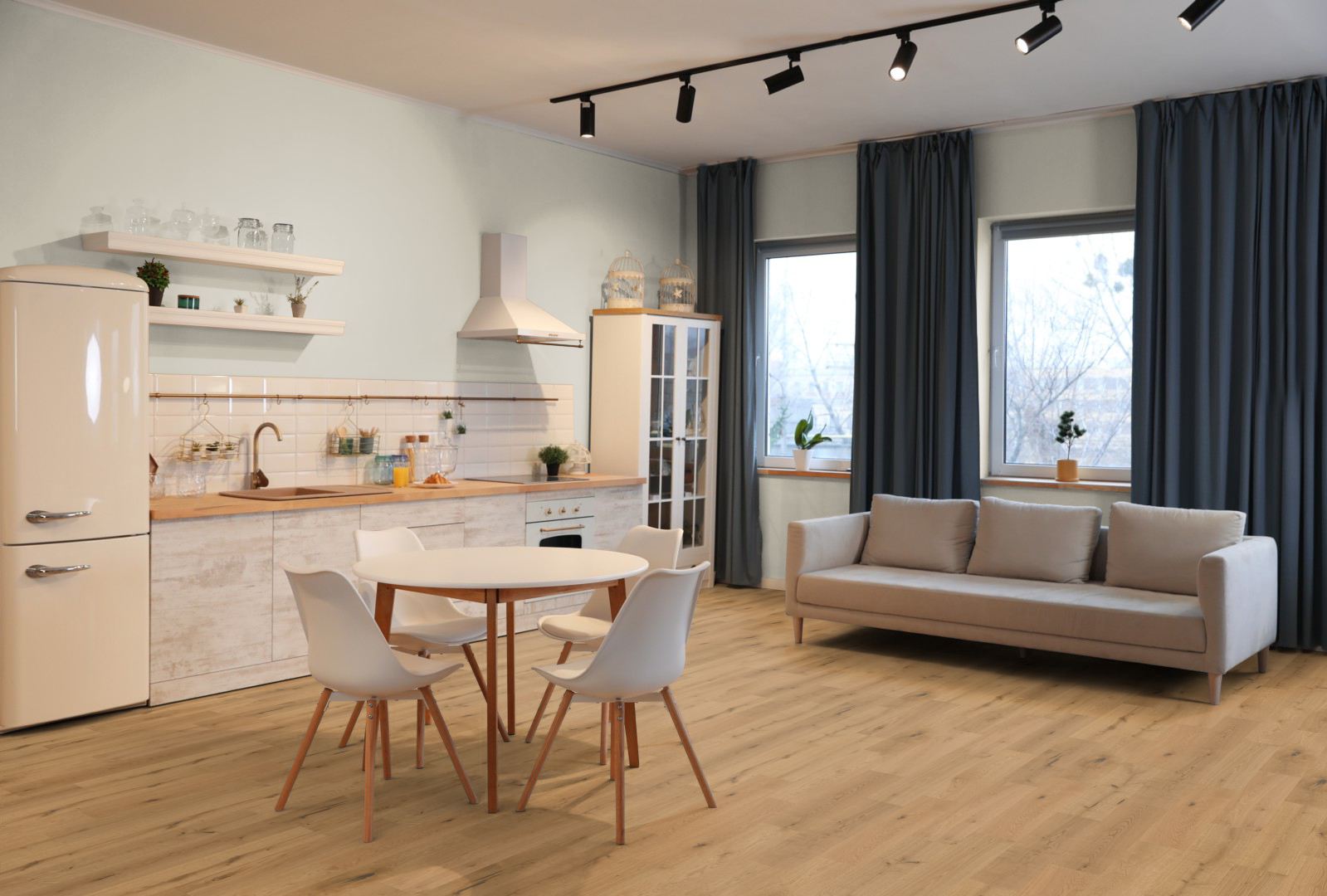 Fumado Oak 180mm Engineered Flooring Lifestyle Picture of the flooring installed in a kitchen and living area. Part of the Lignum Strata Castro Collection of Engineered Wooden Flooring.