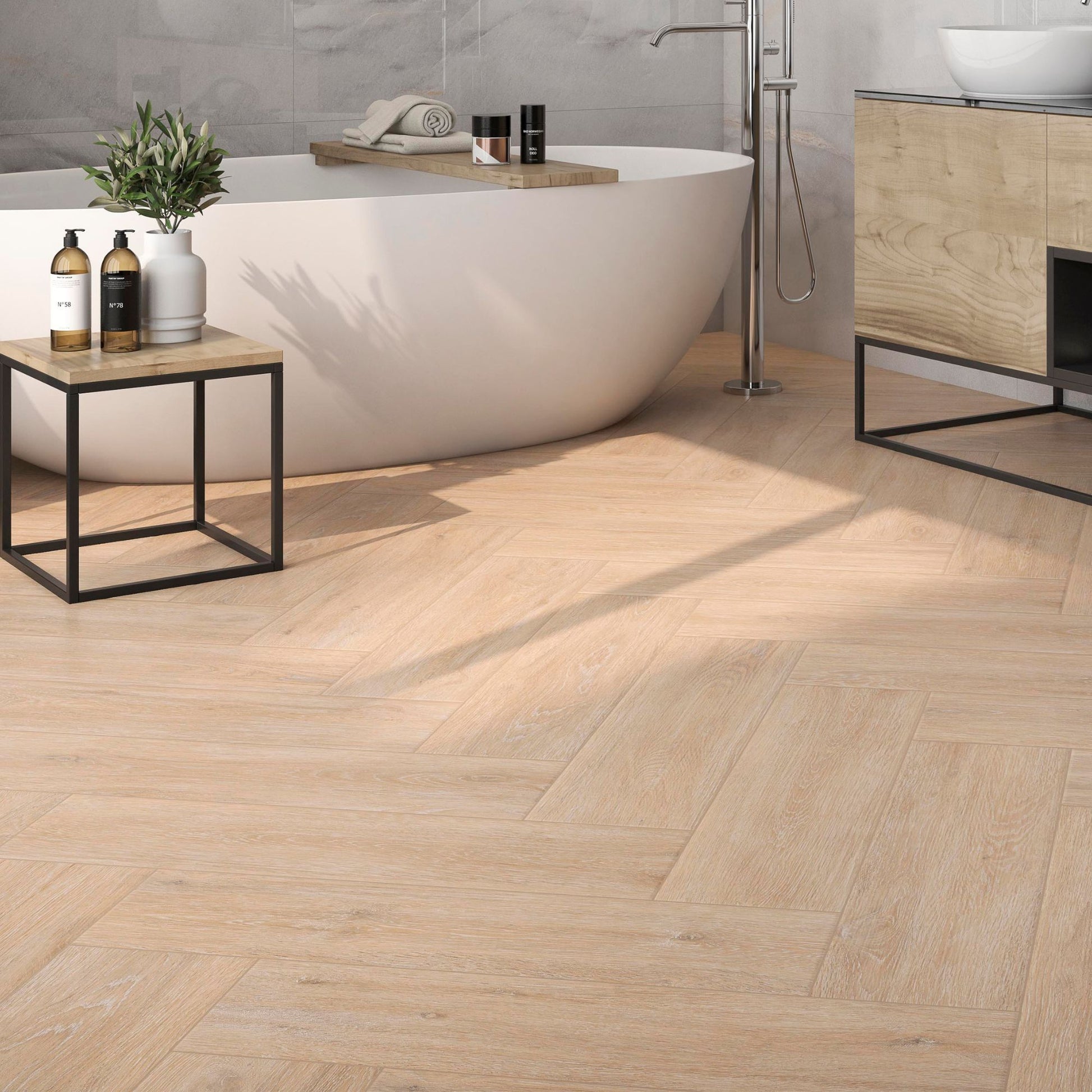 pamesa atrium viggo arce wood effect porcelain tiles in a bathroom in a herringbone pattern