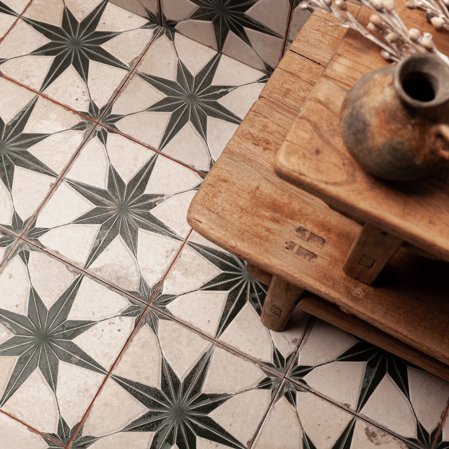 peronda ceramic pattern tile FS Star black tiled in a living room