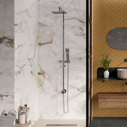 pisa gold large format porcelain tiles on the wall of a bathroom by pamesa