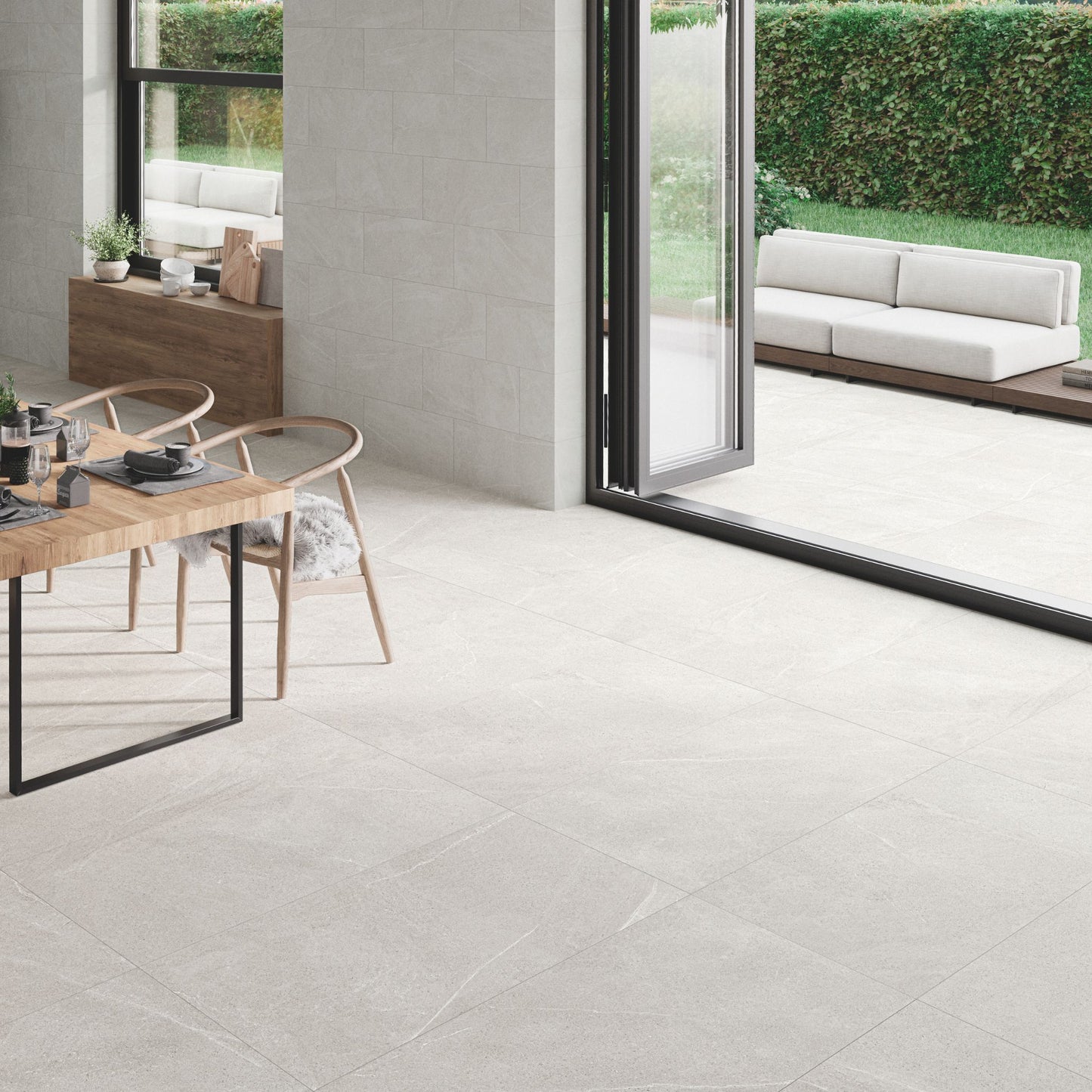 bellevue white tile by stn ceramica tiled in a kitchen and onto a patio