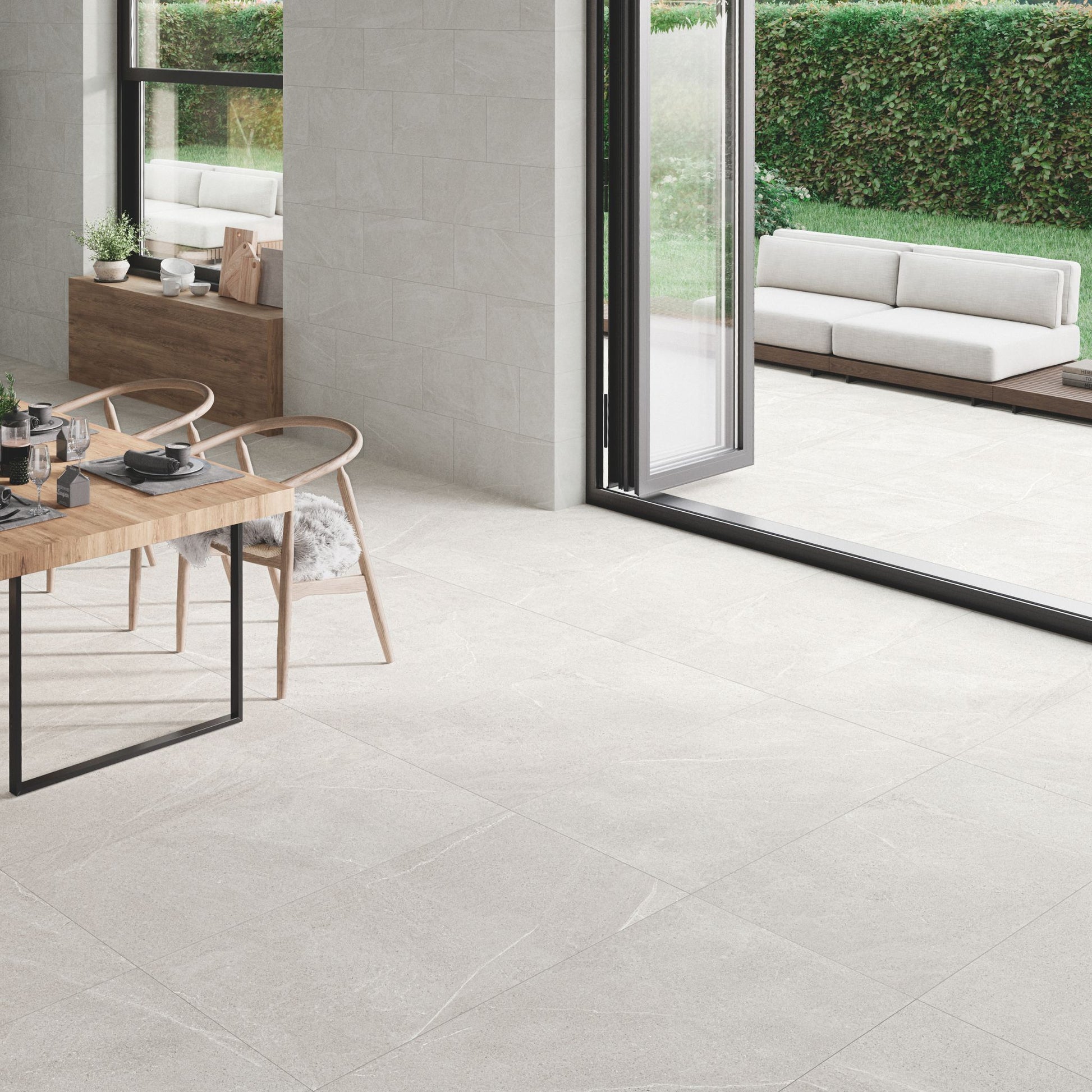 bellevue white tile by stn ceramica tiled in a kitchen and onto a patio